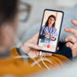 Young,Woman,Patient,In,Conversation,With,Specialist,Over,Video,Conferencing