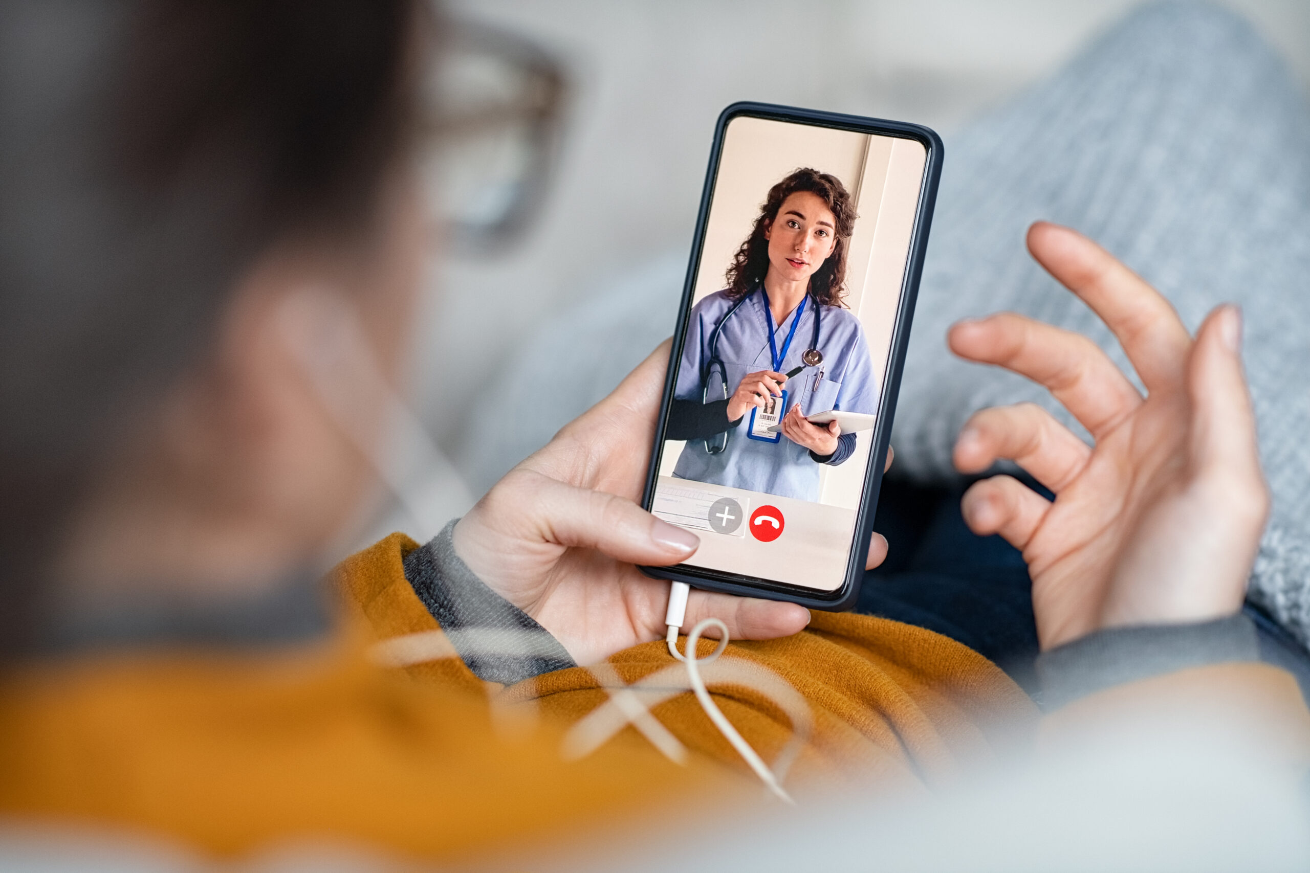 Young,Woman,Patient,In,Conversation,With,Specialist,Over,Video,Conferencing