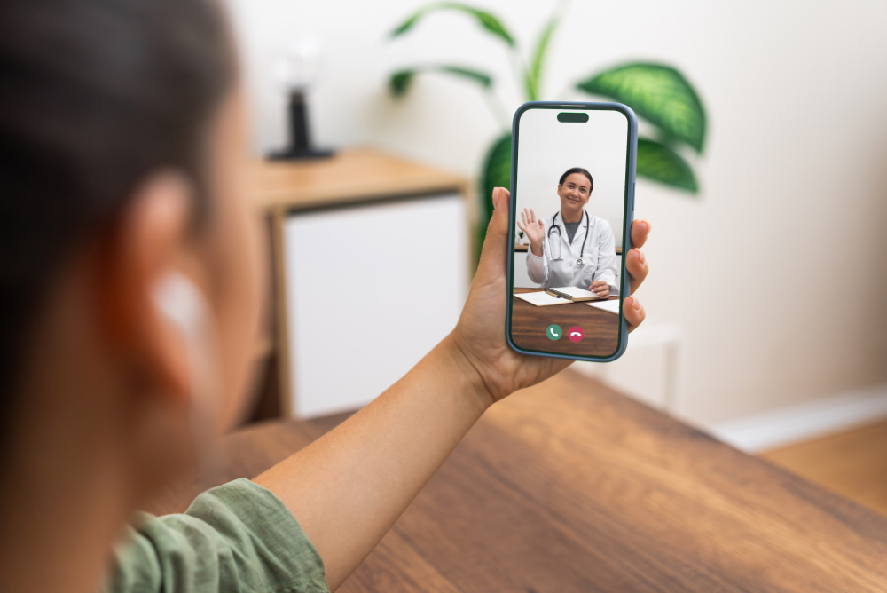 Person with smartphone for telehealth consultation, doctor on call provides medical advice